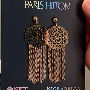 a pair of medium sized paris hilton earrings